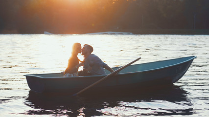 Kissing couple in a boat