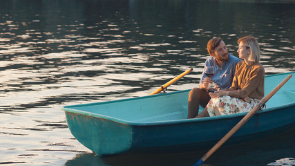 Smiling couple in a boat
