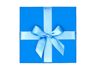 Top view of blue box with a gift and bow isolated