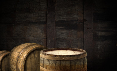 Fototapeta premium background of barrel and worn old table of wood