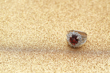 Fototapeta na wymiar red gemstone on diamond ring , Ruby gem