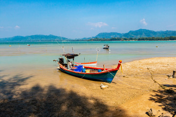 Naklejka na ściany i meble Traditional longtail boats in Thailand