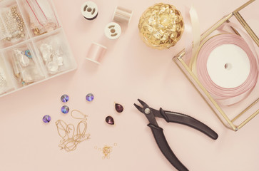 Jewelry designer workplace. Handmade, craft concept. Materials for making jewelry ? pliers,...