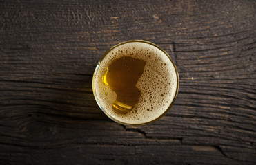 Beer glasses on dark table