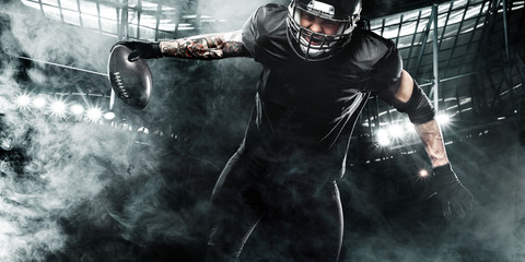 American football sportsman player on stadium. Sports banner and wallpaper with copyspace.
