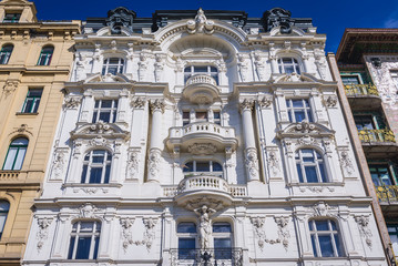 Fototapeta na wymiar Decorated facade of tenement house in Vienna city, capital of Austria