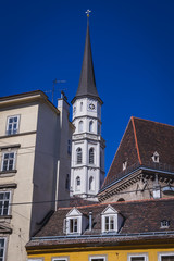 Fototapeta na wymiar Bell tower of St Michael church in Vienna city, capital of Austria