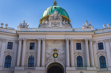 Obraz premium Part of Hofburg Palace - Saint Michael Wing seen from Saint Michael Square in Vienna city, capital of Austria