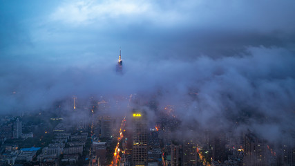 Ariel view of modern city, in cloud