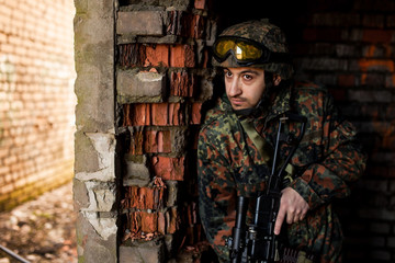 Soldier in the war with arms