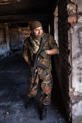 The Arab soldier with the AK-47 Kalashnikov assault rifle