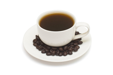 Cup coffee with saucer and coffee beans isolated on a white background