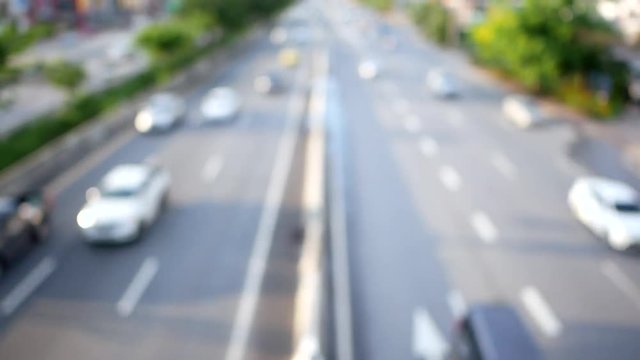 Top view of blurred car traffic on road in urban city
