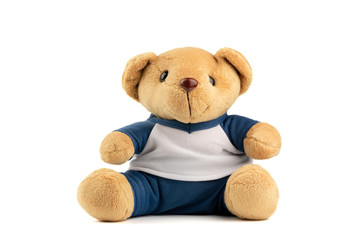 Close-up of Brown teddy bear wearing white blue shirt toy for child isolated on white background.