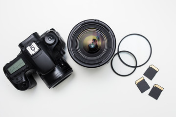 modern photography equipment over white table