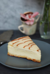 Cheese Cake with Caramel Sauce Isolated Caramel Sauce over Brown Paper with Spoon Sweet Sugar Dessert