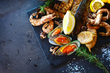 Tasty seafood on a table of a restaurant cuisine. Mediterranean cuisine.