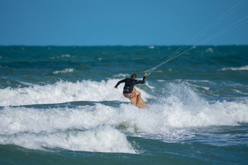 unknown kite boarder heads out to sea