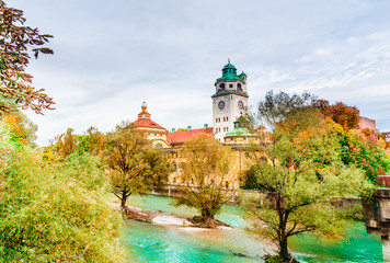 Munich, Germany - autumn view of Isar river with the Muellersches volksbad