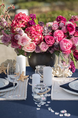 Table setting at a luxury wedding or another catered event. Marine themes