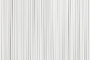 White vertical background  based on wooden sticks.