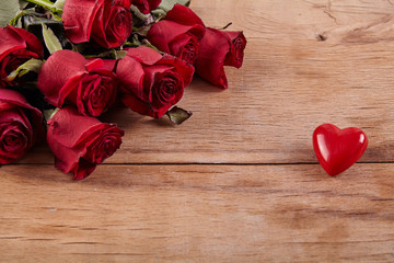 Red roses on background