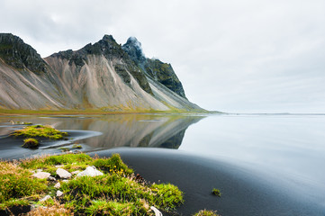 Mountains on the shore of Atlantic ocean in Iceland