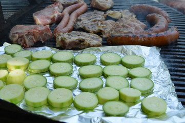 Meat on barbecue with vegetable