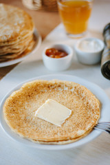 Butter and pancakes - russian national food on restaurant.