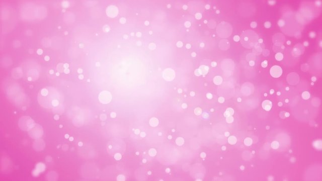 Romantic pink holiday background with glowing bokeh particles.