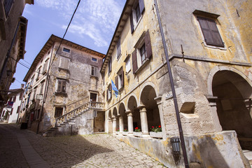 Beautiful arcs on old authentic Istrian building in Groznjan, Croatia. 