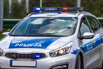 close up on Policja (Police) sign on car. Poland - obrazy, fototapety, plakaty