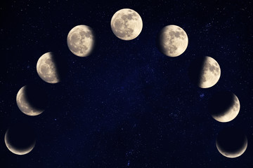 Naklejka premium Phases of the moon over blue sky