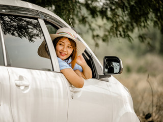 Asian girl in car with map travel concept