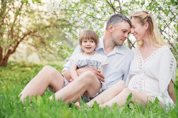 Fototapeta premium happy family on spring garden