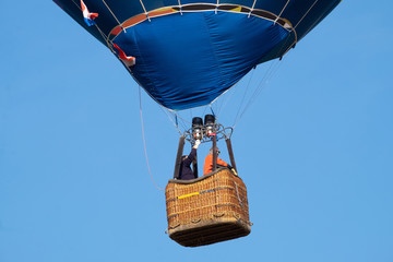 Hot-air balloon in flight nears the ground, It stated to lose altitude as there was a instructing pilot  on board learning soft landings.  