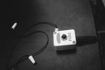 Remote button fire earplugs shooting sports