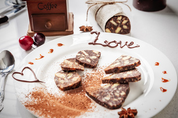 Homemade sweet chocolate sausage cut into pieces