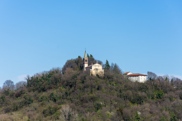 Fototapeta premium Church in the trees on the hill in Altavilla Vicentina