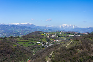 Fototapeta na wymiar Beautiful landscape with snowy alps on the background seen from the Romeo's Tower in Montecchio Maggiore