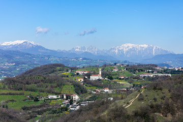 Fototapeta na wymiar Beautiful landscape with snowy alps on the background seen from the Romeo's Tower in Montecchio Maggiore