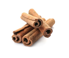 Aromatic cinnamon sticks on white background