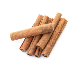 Aromatic cinnamon sticks on white background