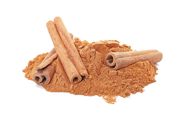 Aromatic cinnamon sticks and powder on white background