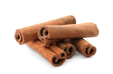 Aromatic cinnamon sticks on white background