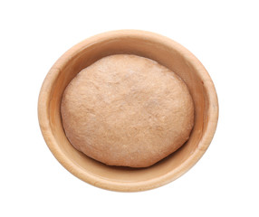 Bowl with raw rye dough on white background, top view