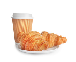 Plate with tasty croissants and cup of coffee on white background