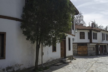 Fototapeta premium Ancient residential district with narrow alley and authentic architecture from hoary antiquity Varosha, Blagoevgrad, Bulgaria