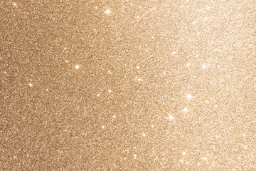 Golden background with glitter light flare blur, christmas background