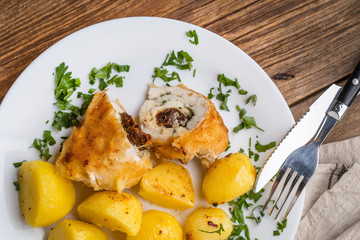 Chicken breast stuffed with cheese and dried tomatoes.